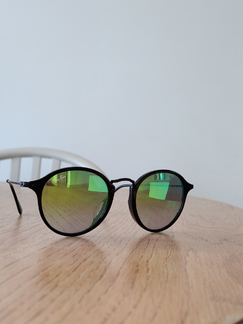 Ray-Ban Black Frame Sunglasses with Green Mirrored Lenses
